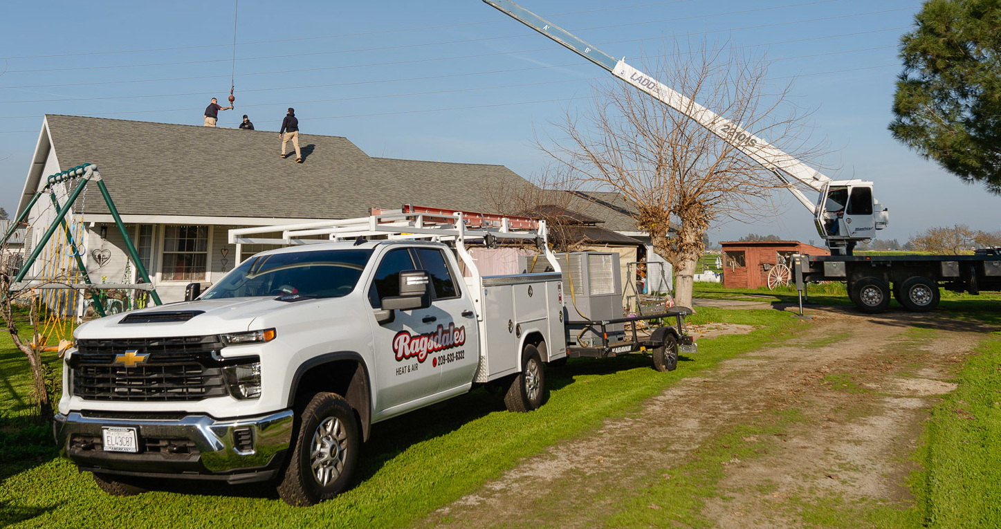 Technician working on AC unit